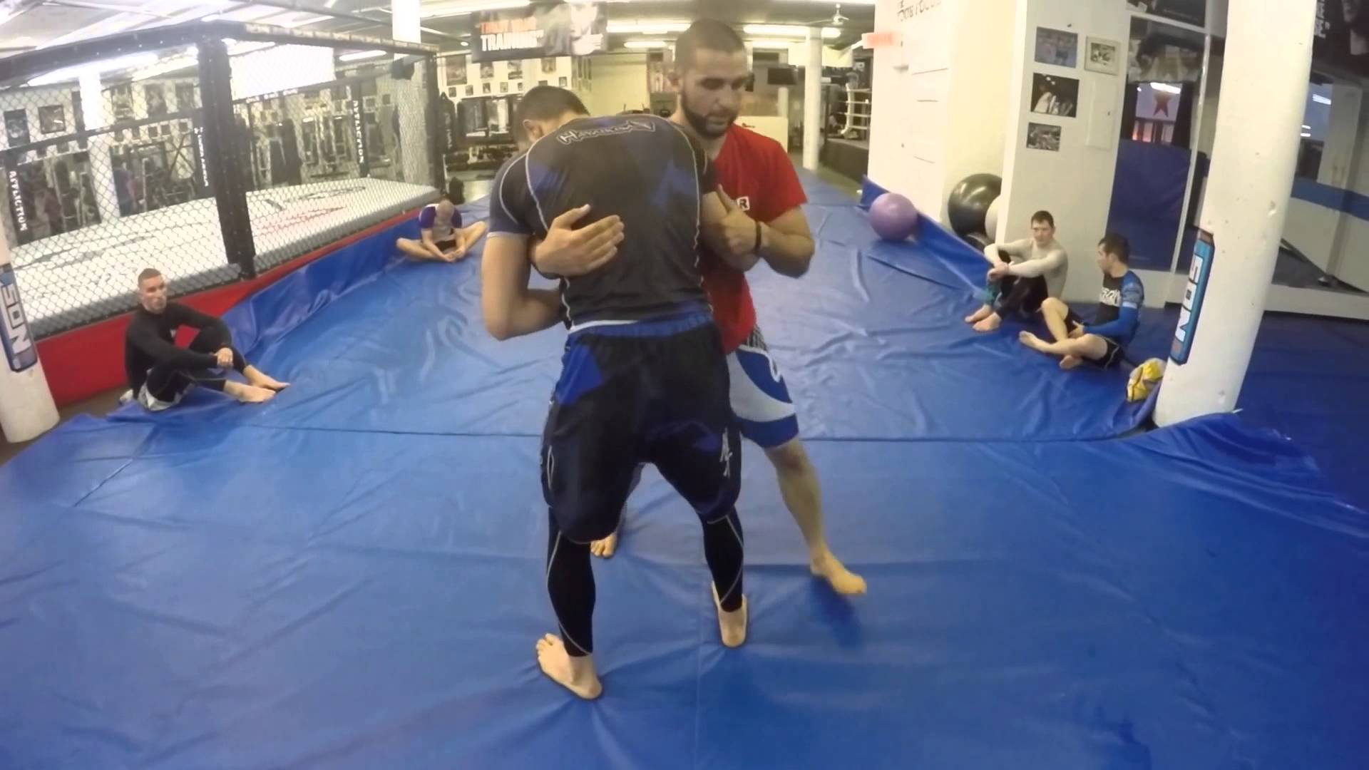 Clinch Takedown – Turning the Corner from Over Under Position – Firas Zahabi