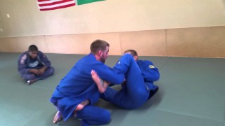 Lasso sweep to knee on belly