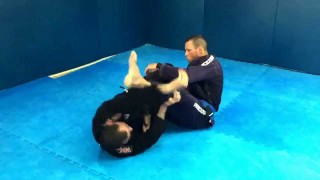 Transition from the 50/50 guard to the foot bar