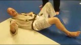 Brown Belt Resets His Knee After It Pops Out Of Place
