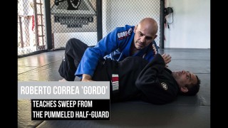 Sweep from the pummeled half guard – Roberto Correa
