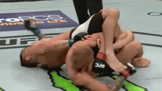 TJ Dillashaw Rolls For A Calf Slicer Attempt