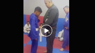 Poor Kid Cries as Instructor Gives him his first Gi