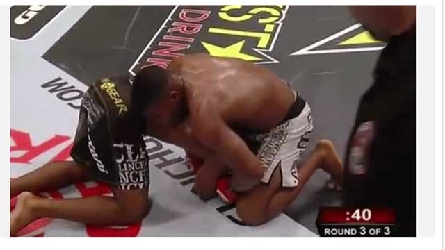 Paul Daley attemps an Omoplata on Woodley