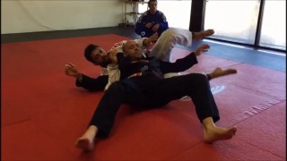 Escaping Omoplata to crucifix – Robson Moura