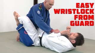 An Easy Wristlock from the Guard – Stephan Kesting & Jeff Mesazros
