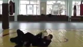 Flying Armbar knocks the guy out of his socks