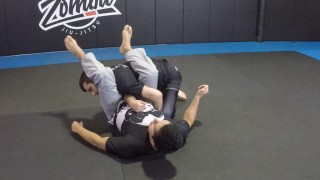 Right or wrong to cross feet in armbar? – Nelson Puentes