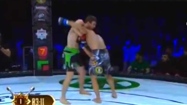 Fighter Submits Opponent With a Sneaky Guillotine Knee Combo