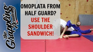 Omoplata From Half Guard – Using the Shoulder Sandwich!