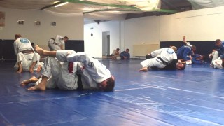 Throwback: Roger Gracie Rolling With Georges St-Pierre in Gi