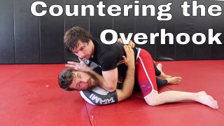Bait the Guard Pass for this Half Guard Sweep – Nick Albin