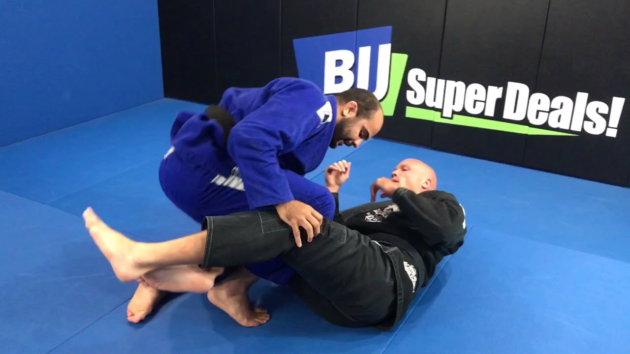 Sweep While Getting Smashed In Half-Guard By Josh Roth