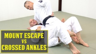 How to Escape Mount When His Ankles Are Crossed Under You?