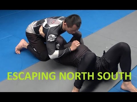 Escaping north south and choosing the correct escape based on arm position (Lachlan Giles)