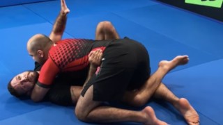 How To Use The Half Butterfly From Half Guard by Tom Deblass
