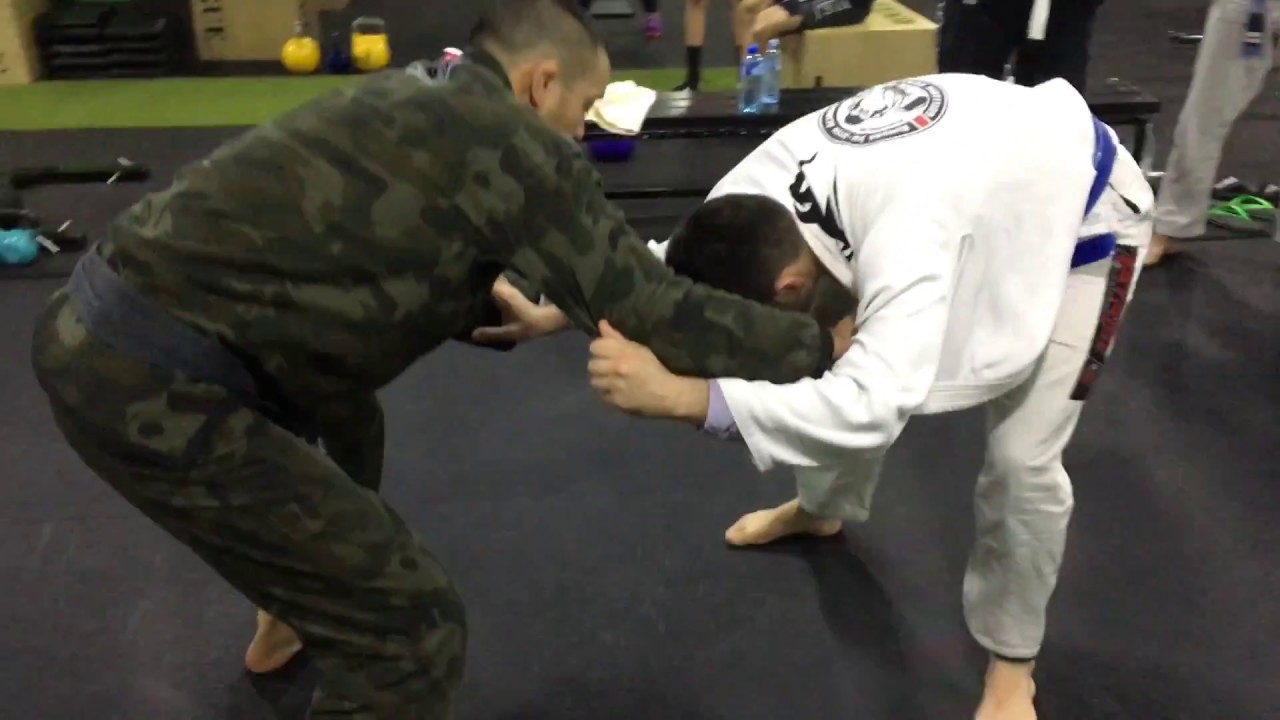 Pulling half guard straight to a sweep